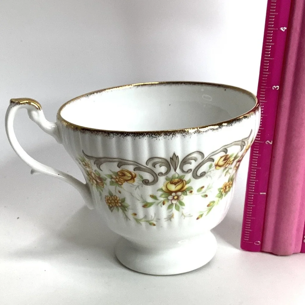 Vintage  Tea Cup Royal Heritage Bone‎ China England Yellow Floral Curly